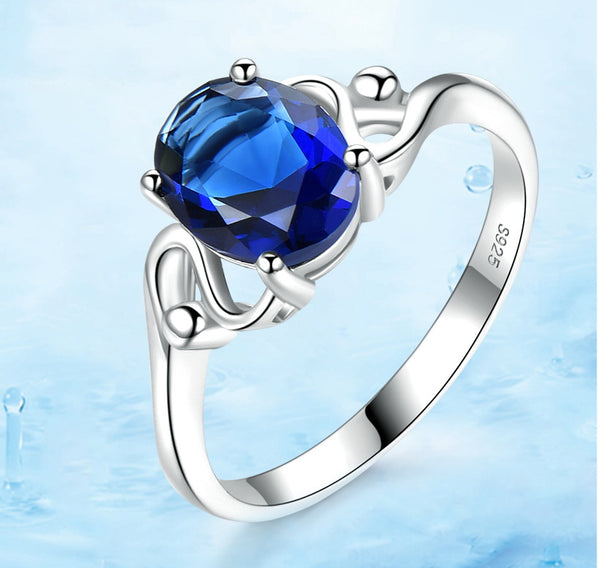 Oval 7 x 9 Sapphire Blue Cubic Zirconia Sterling Silver Ring
