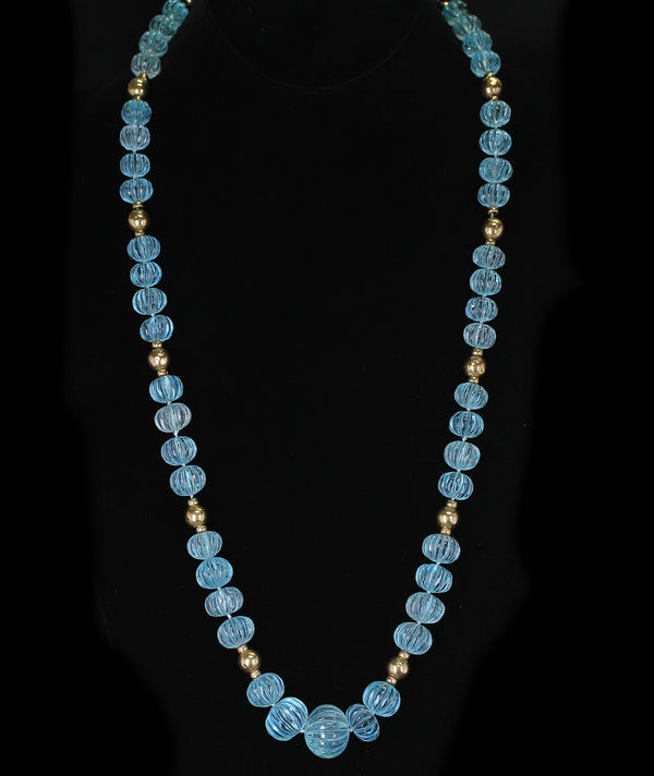 Carved Blue Topaz Necklace with Gold Beads