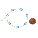 Oval Genuine Blue Topaz 18k Yellow Gold Adjustable Bracelet