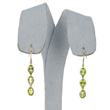Three Stone Oval Peridot Dangling Earrings