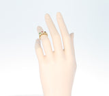 Van Cleef and Arpels Tri-Floral Emerald, Ruby, Sapphire and Diamond Ring, 18K