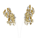 1970s Sterlé Yellow and White Gold Wavy Earrings with Diamonds