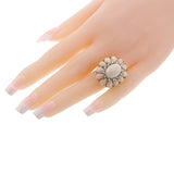 Coral Cabochon and Diamond Floral Cocktail Ring, 18k