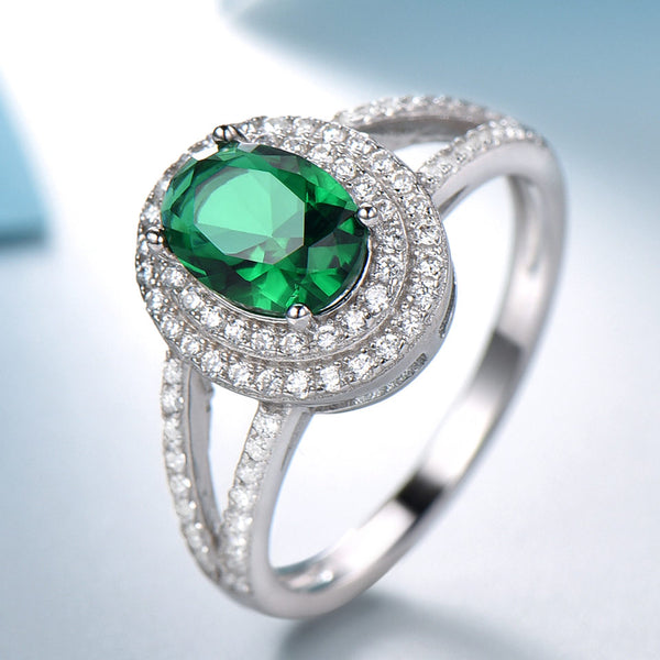 Oval 6 x 8 Emerald Green Cubic Zirconia Double Halo Split Shank Sterling Silver Ring