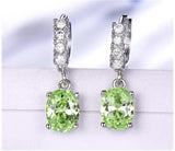 Dangling Oval Peridot Green Cubic Zirconia Sterling Silver Earrings