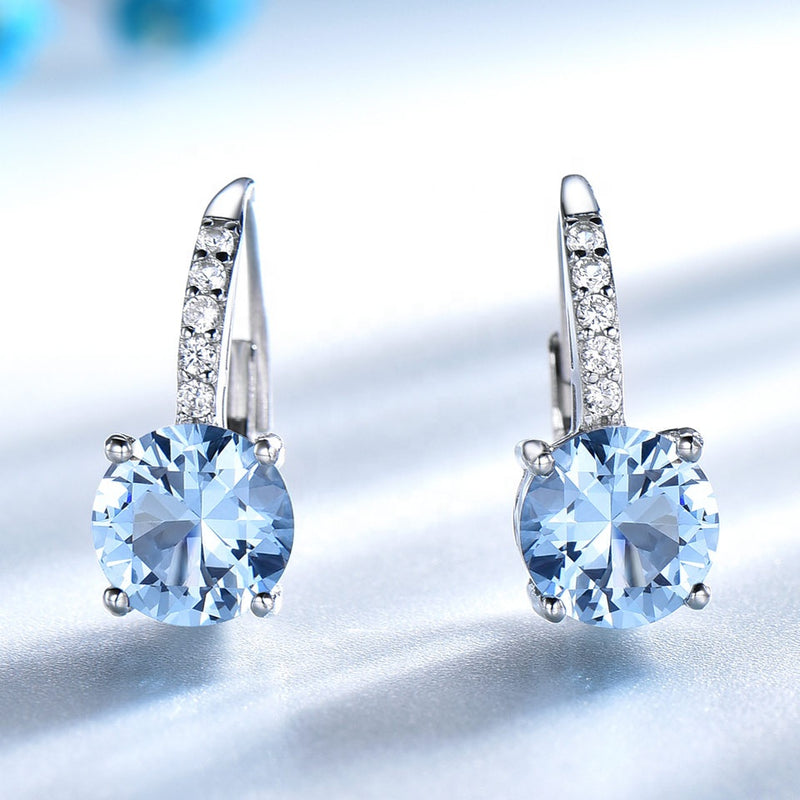 Round Aquamarine Sky Blue Cubic Zirconia Dangling Sterling Silver Earrings