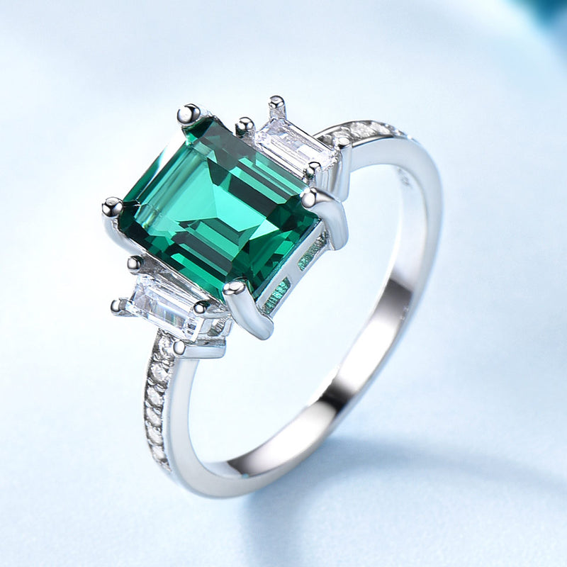 Octagonal Step-Cut 9 x 7 Emerald Green Cubic Zirconia Sterling Silver Ring