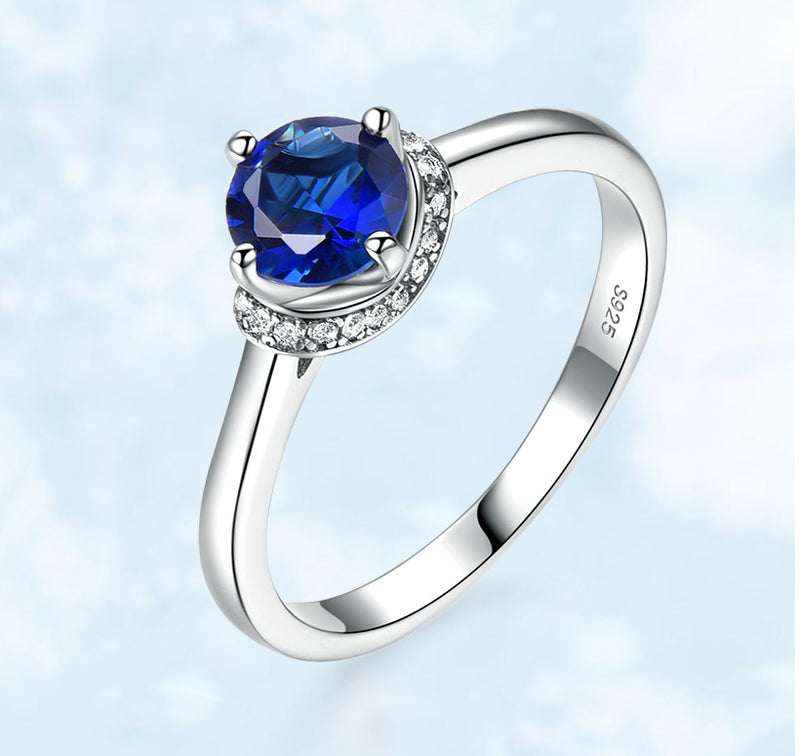 Round 6MM Sapphire Blue Cubic Zirconia Circular Halo Sterling Silver Ring