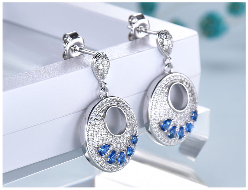 Circular Sapphire Blue Cubic Zirconia Sterling Silver Earrings