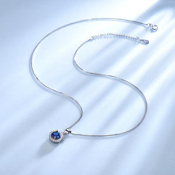 Round Halo Sapphire Blue Cubic Zirconia Pendant Necklace, Sterling Silver