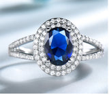 Oval 6 x 8 Sapphire Blue Cubic Zirconia Double Halo Split Shank Sterling Silver Ring