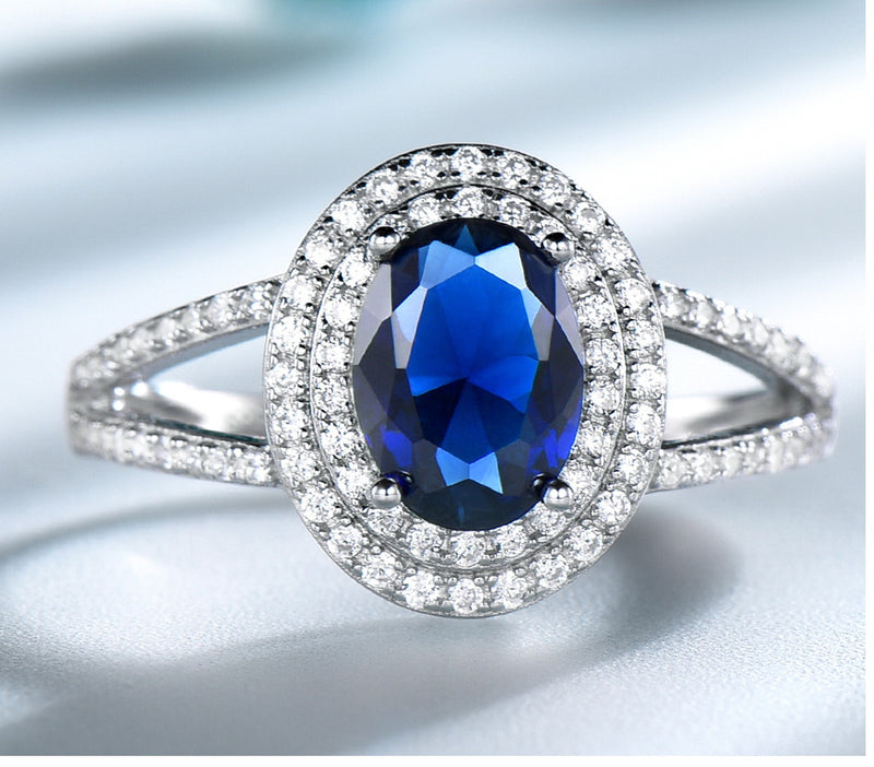 Oval 6 x 8 Sapphire Blue Cubic Zirconia Double Halo Split Shank Sterling Silver Ring