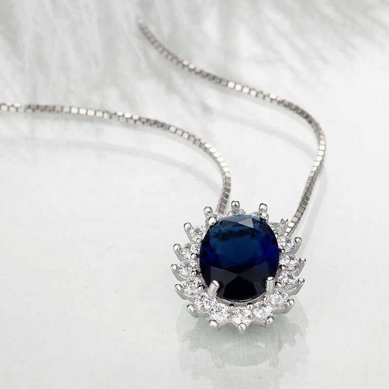 Oval Halo-Set Sapphire Blue Cubic Zirconia Pendant Necklace, Sterling Silver