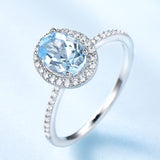Oval 6 x 8 Aquamarine Blue Cubic Zirconia Sterling Silver Halo Ring