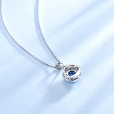 Round Halo Sapphire Blue Cubic Zirconia Pendant Necklace, Sterling Silver