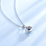 Round Halo Sapphire Blue Cubic Zirconia Pendant Necklace, Sterling Silver