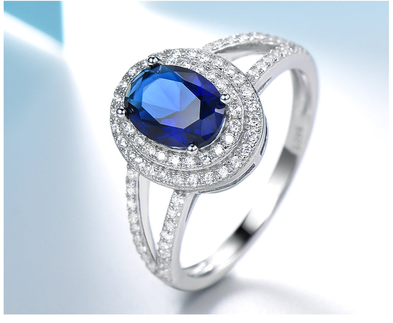 Oval 6 x 8 Sapphire Blue Cubic Zirconia Double Halo Split Shank Sterling Silver Ring