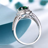 Oval 6 x 8 Emerald Green Cubic Zirconia Double Halo Split Shank Sterling Silver Ring