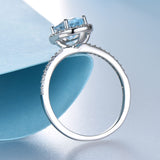 Oval 6 x 8 Aquamarine Blue Cubic Zirconia Sterling Silver Halo Ring