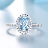 Oval 6 x 8 Aquamarine Blue Cubic Zirconia Sterling Silver Halo Ring