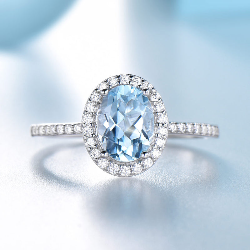 Oval 6 x 8 Aquamarine Blue Cubic Zirconia Sterling Silver Halo Ring