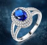 Oval 6 x 8 Sapphire Blue Cubic Zirconia Double Halo Split Shank Sterling Silver Ring