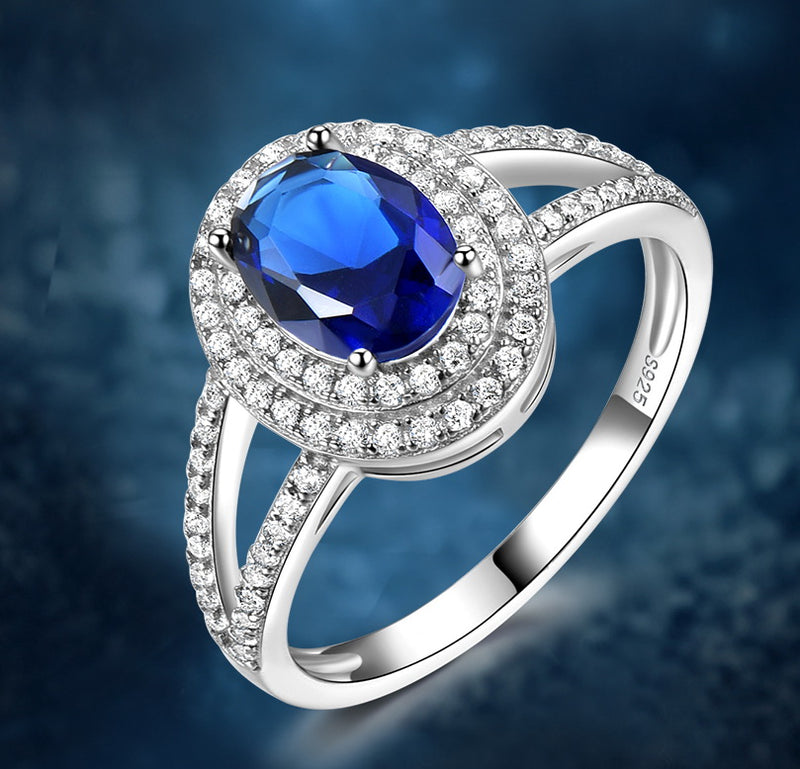 Oval 6 x 8 Sapphire Blue Cubic Zirconia Double Halo Split Shank Sterling Silver Ring