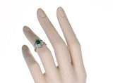 Natural Emerald Step-Cut Emerald Ring with 0.54 carats of Diamonds
