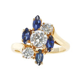 Chaumet, Paris Marquise Sapphire and Round Diamond Ring, 18 Karat Yellow Gold