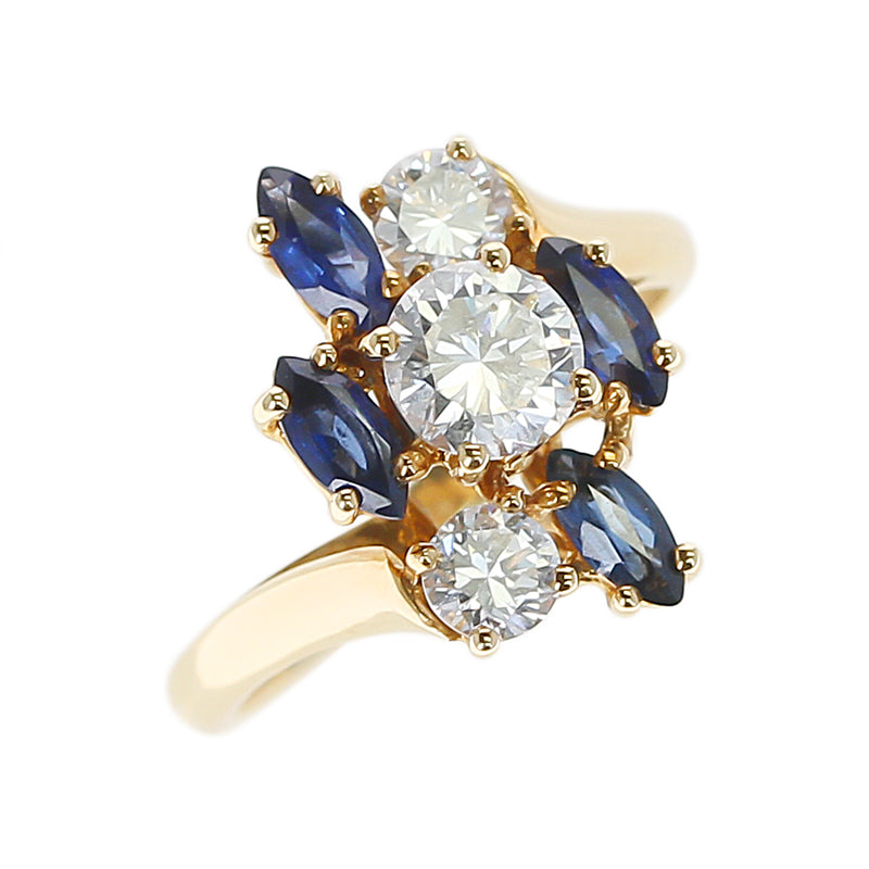 Chaumet, Paris Marquise Sapphire and Round Diamond Ring, 18 Karat Yellow Gold