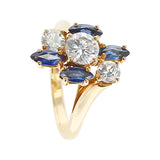 Chaumet, Paris Marquise Sapphire and Round Diamond Ring, 18 Karat Yellow Gold