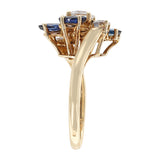 Chaumet, Paris Marquise Sapphire and Round Diamond Ring, 18 Karat Yellow Gold