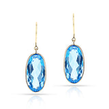 Blue Topaz Oval Shape Dangling Earrings made in 18 Karat Yellow Gold.