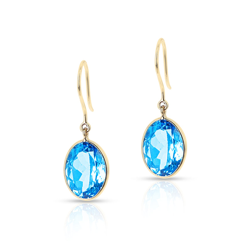 Blue Topaz Oval Shape Dangling Earrings made in 18 Karat Yellow Gold.