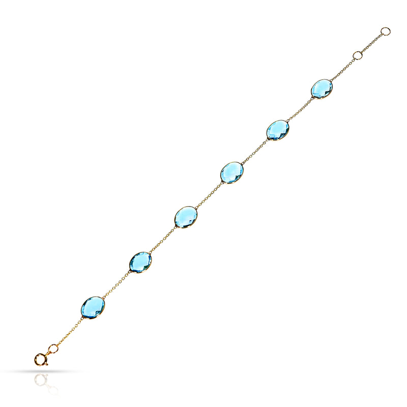 Oval Faceted Blue Topaz Adjustable Bracelet, 18k Yellow Gold