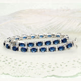 Oval Sapphire Blue and White Colored Cubic Zirconia Sterling Silver Bracelet
