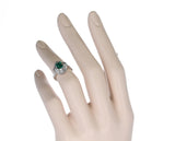 Natural Emerald Step-Cut Emerald Ring with 0.54 carats of Diamonds