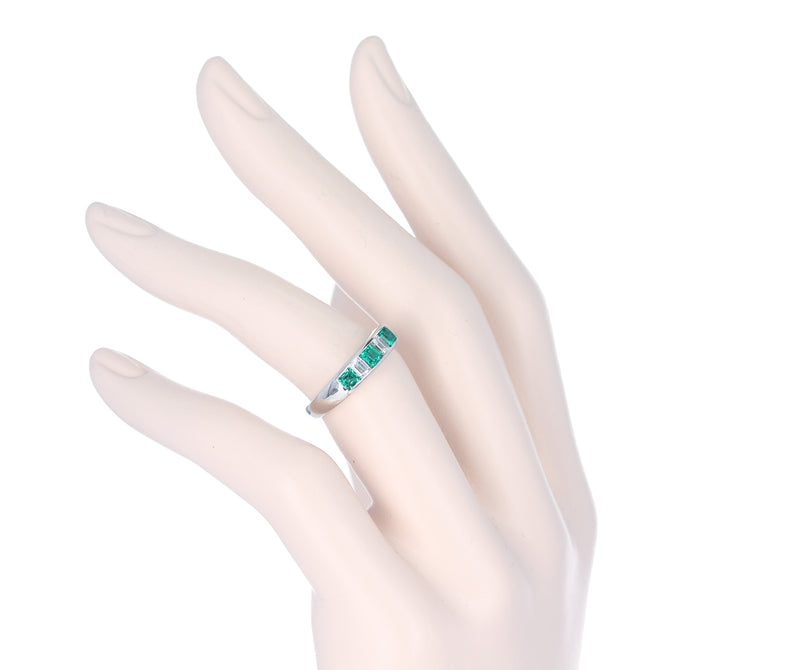 Channel-Set Invisible Emerald and Diamond Platinum Band